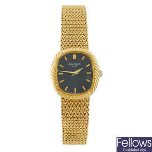 PATEK PHILIPPE - an 18ct gold lady's Ellipse bracelet watch.