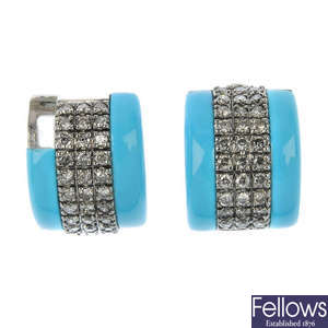A pair of reconstituted turquoise and diamond earrings. 