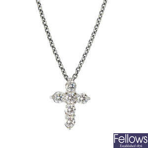 BOODLES - a platinum diamond cross pendant.
