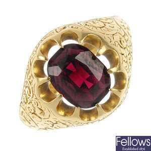A gentleman's early 20th century 18ct gold garnet single-stone ring.