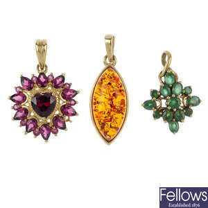 An amethyst and diamond pendant and ear pendant set, together with three gem-set pendants.  