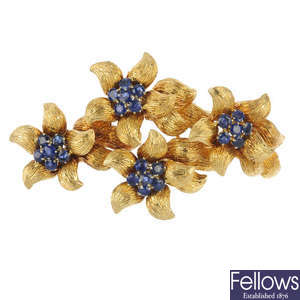 A mid 20th century 18ct gold sapphire floral brooch.
