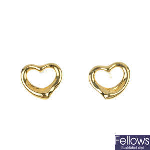 TIFFANY & CO. -  a pair of 18ct gold 'Open Heart' ear studs, by Elsa Peretti for Tiffany & Co.