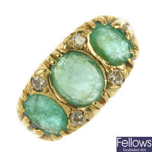 An 18ct gold emerald and diamond ring. 