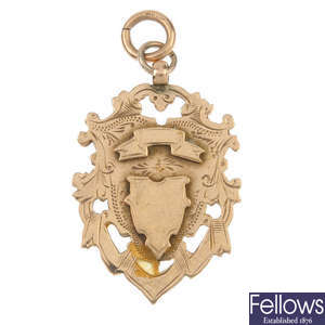 An early 20th century 9ct gold Albert chain and medallion.