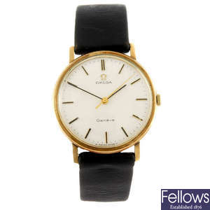 OMEGA - a gentleman's 9ct gold Geneve wrist watch with another Omega watch.