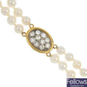 A diamond and cultured pearl two-row necklace.