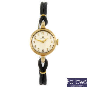 OMEGA - a 9ct gold lady's wrist watch.