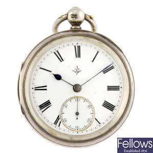 A silver open face pocket watch with two other pocket watches.