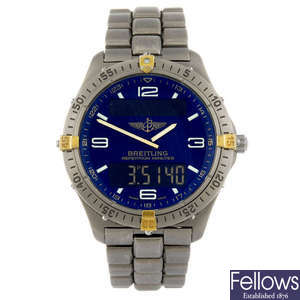 (973021394) BREITLING - a gentleman's titanium Aerospace bracelet watch.