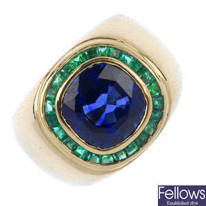 A sapphire and emerald cluster ring.