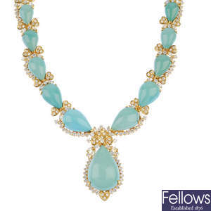 A turquoise and diamond necklace.