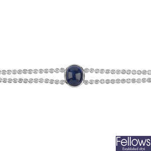 A star sapphire and diamond double-strand bracelet.