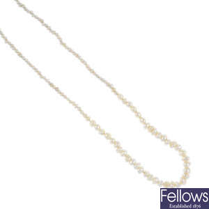 A seed pearl single-strand necklace. 