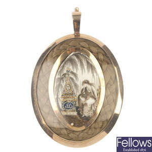 An early 19th century gold ivory memorial pendant.