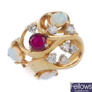A synthetic ruby, opal and diamond dress ring.