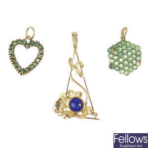 A selection of four gem-set pendants. 