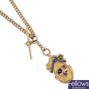 An early 20th century 9ct gold enamel medallion and Albert chain. 