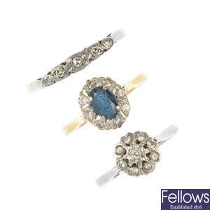 An assortment of four mid 20th century and later 18ct gold diamond rings.
