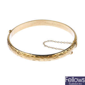 Two 9ct gold hinged bangles.