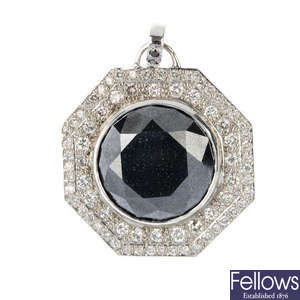 A diamond and hematite pendant.