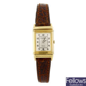 JAEGER-LECOULTRE - a lady's 18ct gold Reverso wrist watch.