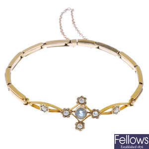 An early 20th century gold aquamarine and pearl bracelet.