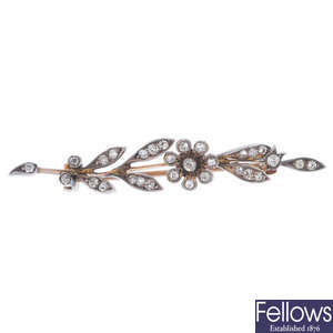 A late 19th century silver and gold diamond floral brooch.