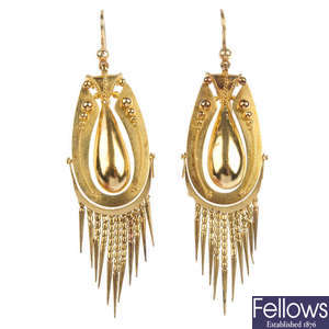 A pair of early 20th century gold ear pendants. 