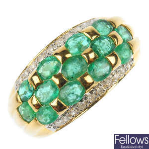 A emerald and diamond dress ring.