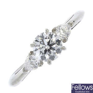 TIFFANY & CO. - a platinum diamond three-stone ring.