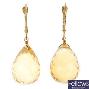 A pair of citrine ear pendants.