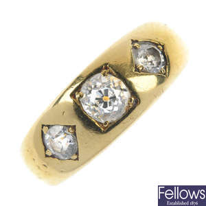 A late 19th century 18ct gold diamond three-stone ring. 