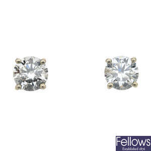 A pair of 18ct gold diamond single-stone ear studs. 