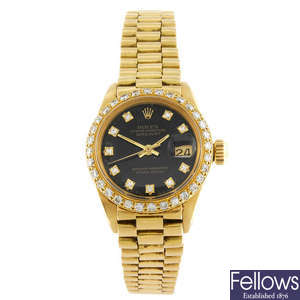 ROLEX - a lady's 18ct gold Oyster Perpetual Datejust bracelet watch. 