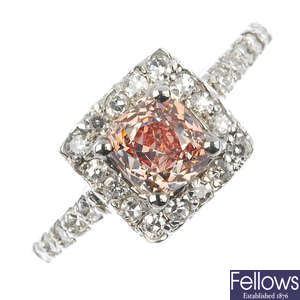 A diamond and colour treated 'pink' diamond ring.