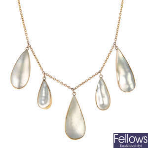 A mother-of-pearl fringe necklace.