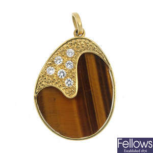 A 1970s 18ct gold tiger's-eye and diamond pendant.