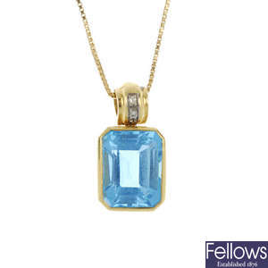 A topaz ring and pendant.