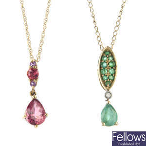 A selection of three gem-set pendants.