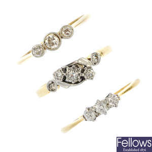 A selection of five 18ct gold diamond and gem-set rings.