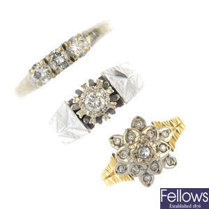 A selection of three 18ct gold diamond rings.