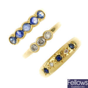 A selection of four 18ct gold gem-set rings. 