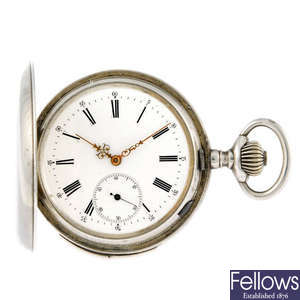 A white metal repeater pocket watch.