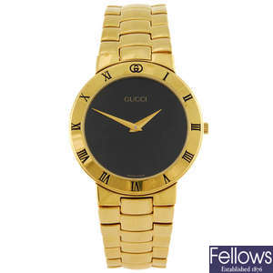 GUCCI - a gentleman's 3300.2M bracelet watch with a lady's Gucci 3300L bracelet watch.