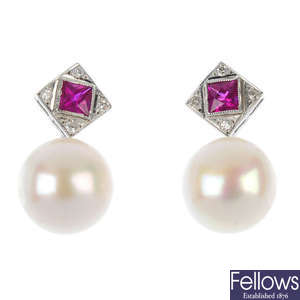 A pair of ruby, diamond and freshwater cultured pearl earrings.