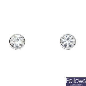 A pair of brilliant-cut diamond ear studs.