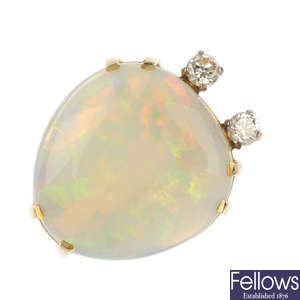 An opal and diamond dress ring.