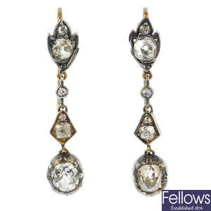 A pair of diamond ear pendants. 