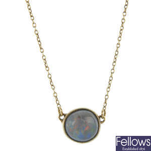 An opal single-stone pendant.